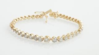 Appraisal: K Yellow Gold Tennis Bracelet each of the li K