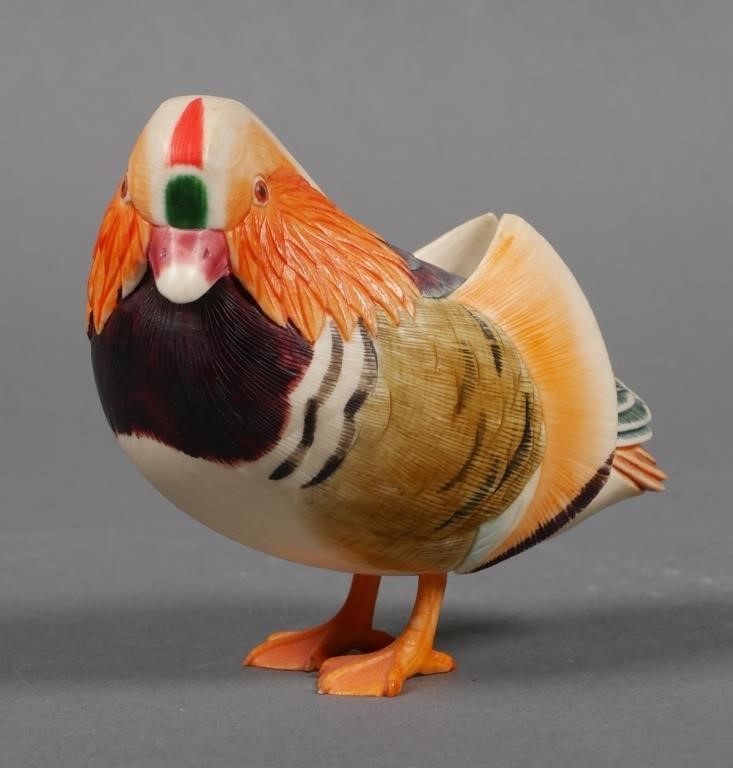 Appraisal: Finely carved Japanese ivory polychrome bird statue Measures high Signed