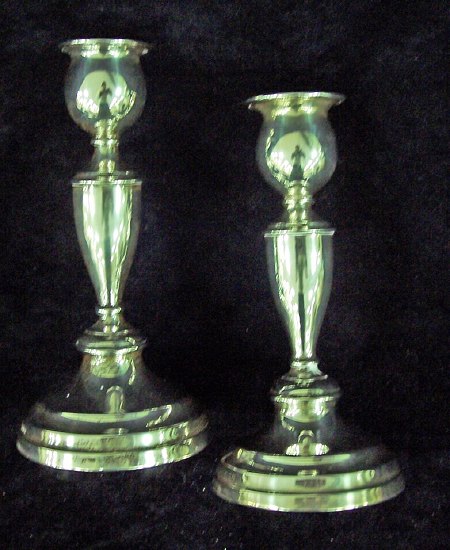 Appraisal: A pair of baluster candlesticks cm high