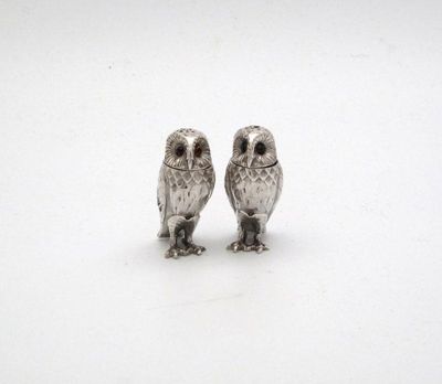 Appraisal: A pair of modern novelty silver owl salt and pepper