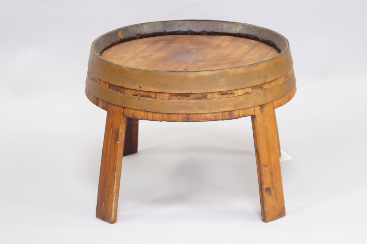 Appraisal: An oak and metal bounded circular occasional table converted from