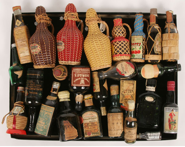 Appraisal: Twenty plus miniature wine bottles many of which are wicker