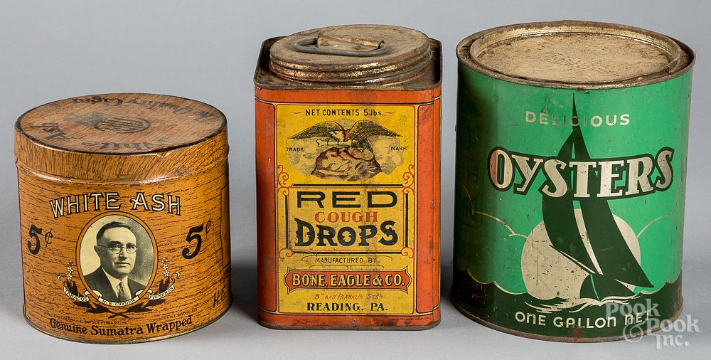 Appraisal: Three tins Three tins to include a Bivalve Oyster Bone