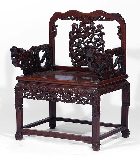 Appraisal: A Chinese hardwood altar chairlate th Centurywith carved dragon arms