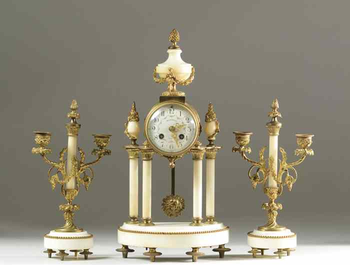 Appraisal: THREE-PIECE FRENCH CLOCK SET Mandereau a Orleans north-central France c