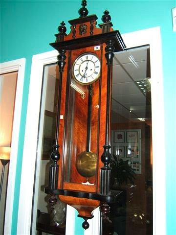 Appraisal: A Vienna regulator wall clock with ebonised walnut case circular