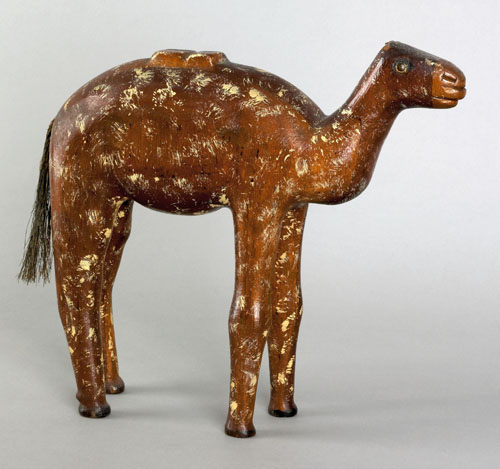 Appraisal: Joseph Gregory carved mahogany camel with horse hair tail h