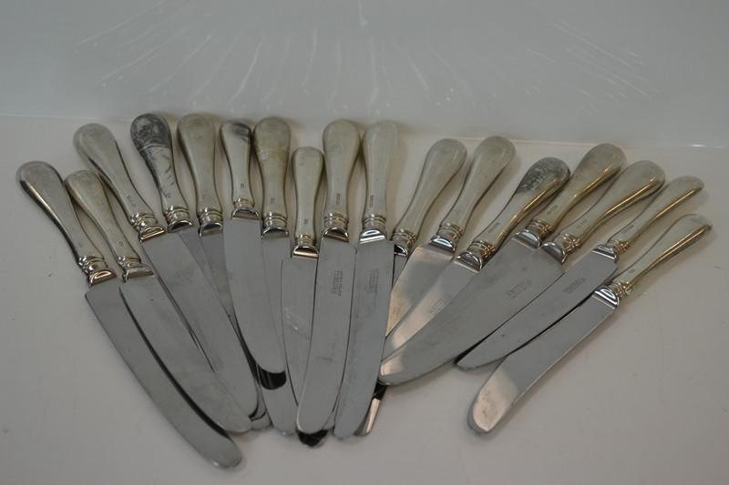 Appraisal: ONE BAG OF STERLING HANDLED ENTREE AND DINNER KNIVES