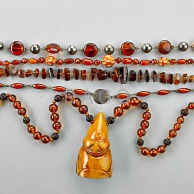 Appraisal: FIVE AMBER NECKLACES th C Turned faceted or tumbled beads