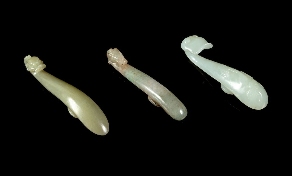 Appraisal: Three Chinese Celadon Jade Belt Hooks Longest length in cm