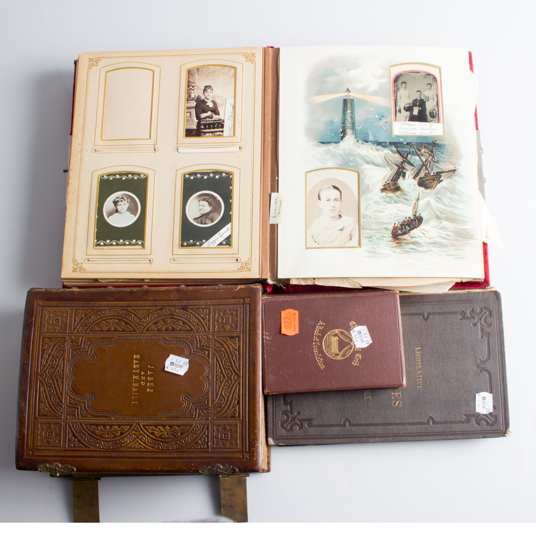 Appraisal: Two Victorian photo albums two memorial books one of Lincoln