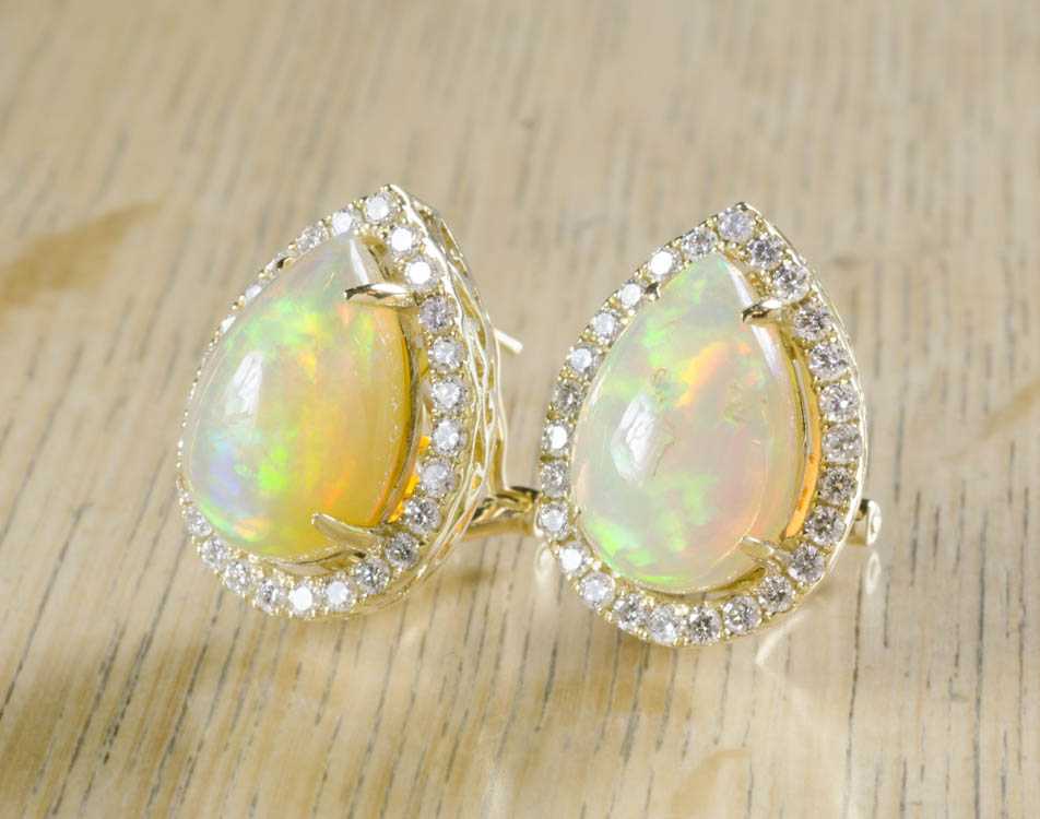 Appraisal: PAIR OF OPAL AND DIAMOND EARRINGS each k yellow gold