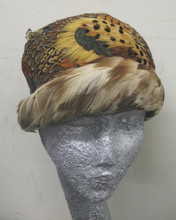 Appraisal: A stylish vintage ladies hat covered in feathers from various