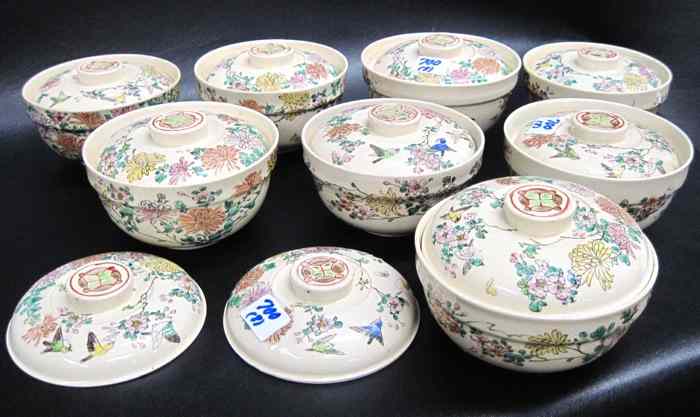 Appraisal: EIGHT CHINESE PORCELAIN COVERED SOUP BOWLS Hand enameled in floral