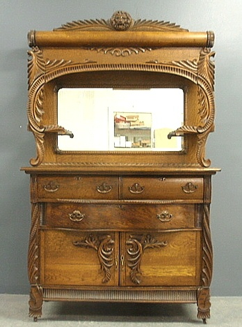 Appraisal: - Oak sideboard early th c with extensively carved crest