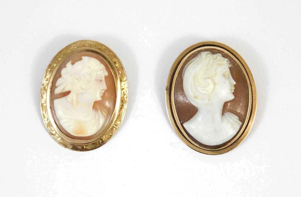 Appraisal: TWO VICTORIAN CAMEO PENDANT BROOCHES including a k yellow gold