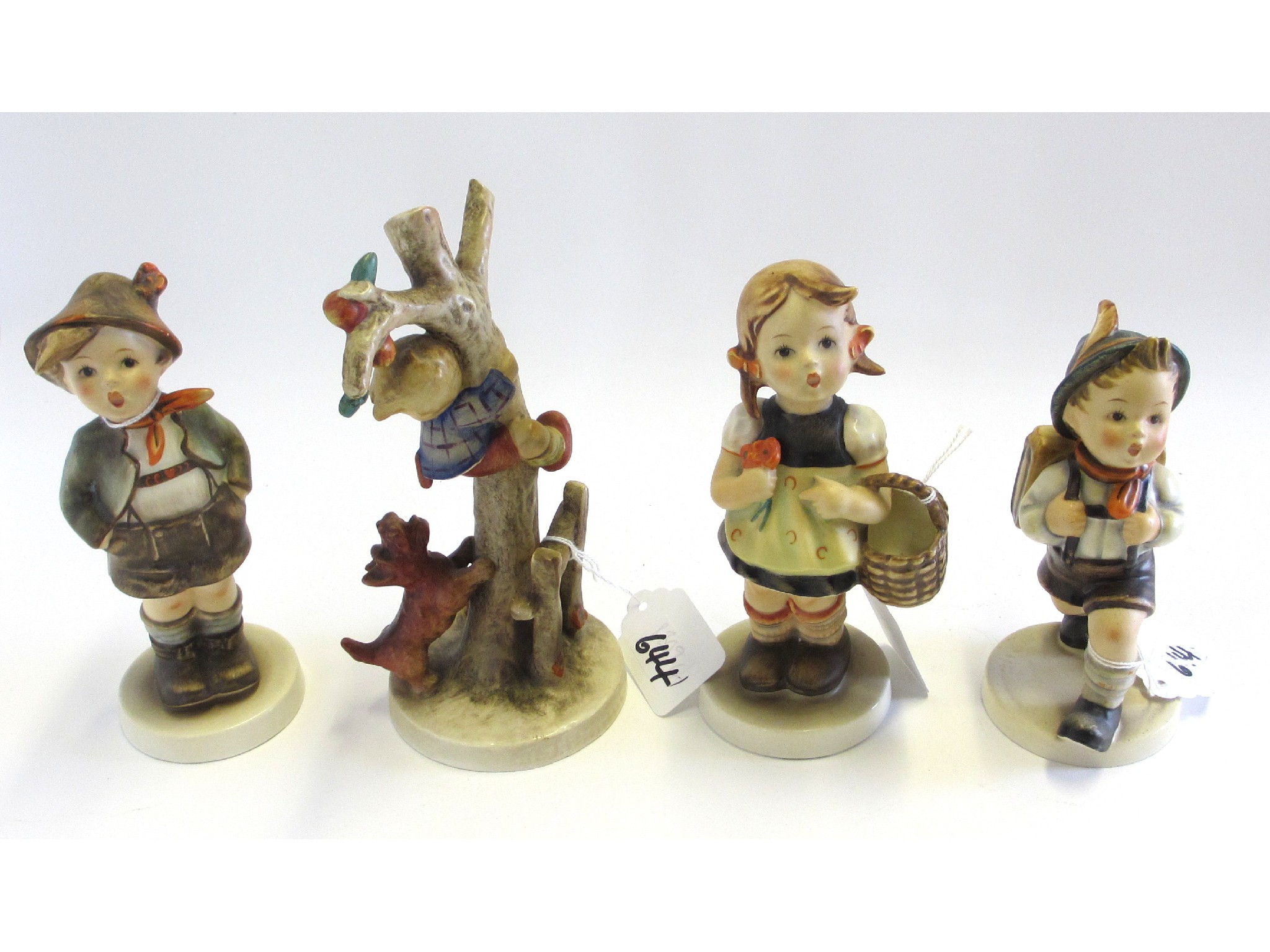 Appraisal: Four Hummel figures to include Sister Brother School Boy and