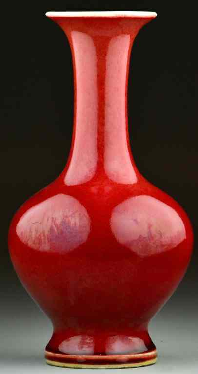 Appraisal: Chinese Oxblood Glazed Porcelain VaseBulbous vase with long narrow neck