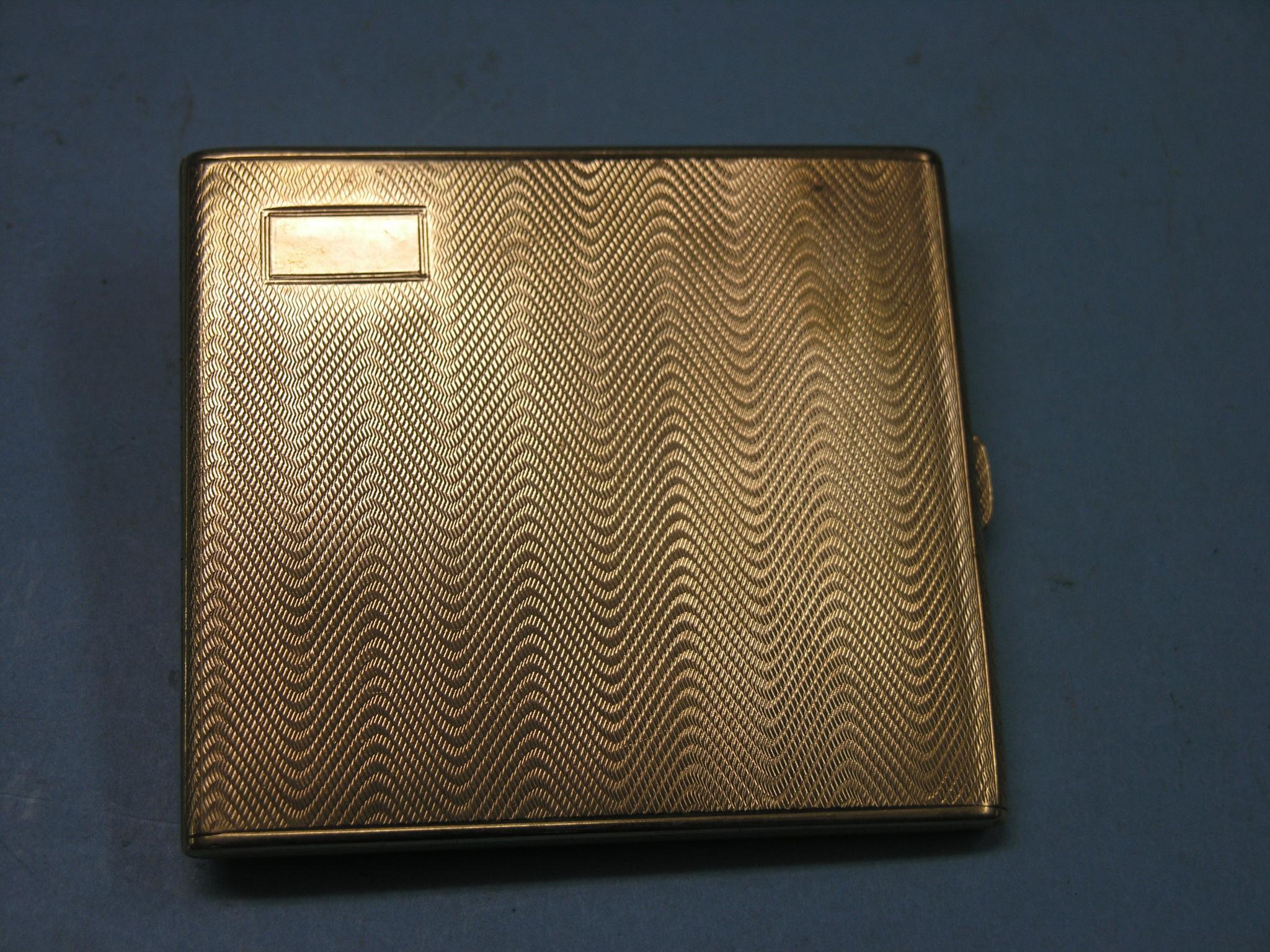 Appraisal: An engine-turned ct gold cigarette case Birmingham grams personalised inscription