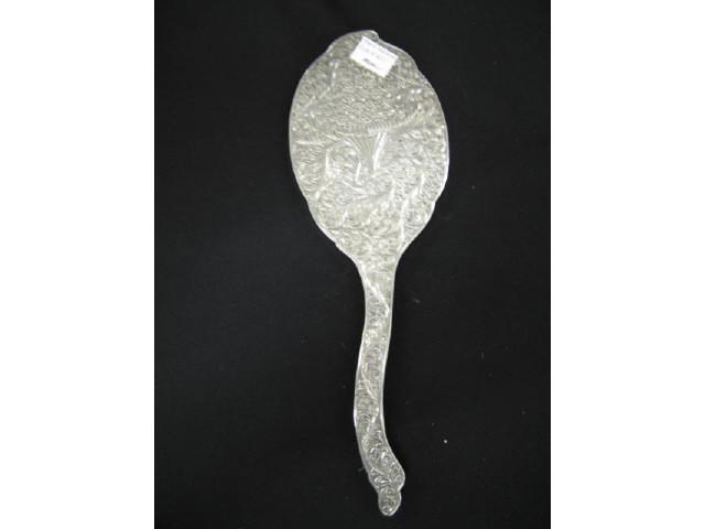 Appraisal: Sterling Sivler Hand Mirror elaborate engraved floral excellent