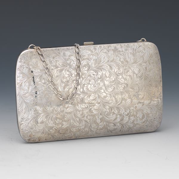 Appraisal: RALPH LAUREN STERLING SILVER OPERA CLUTCH x Chased sterling silver