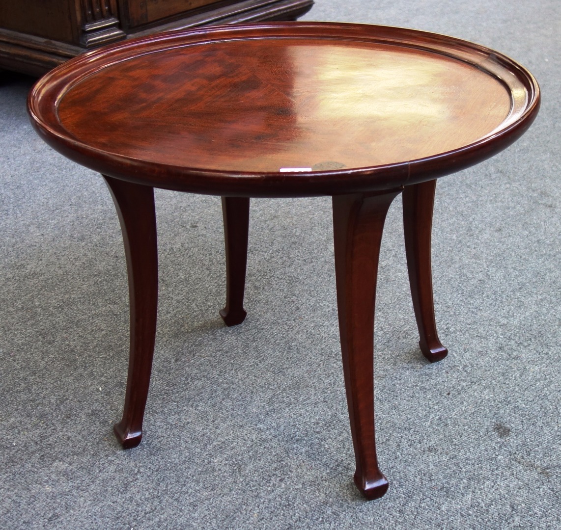 Appraisal: An early th century mahogany circular occasional table on four