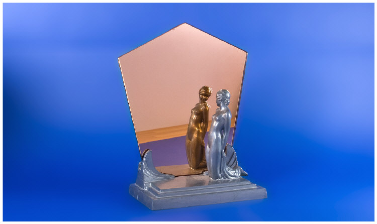 Appraisal: Tinted Glass Surmounted by a Posing Nude Lady