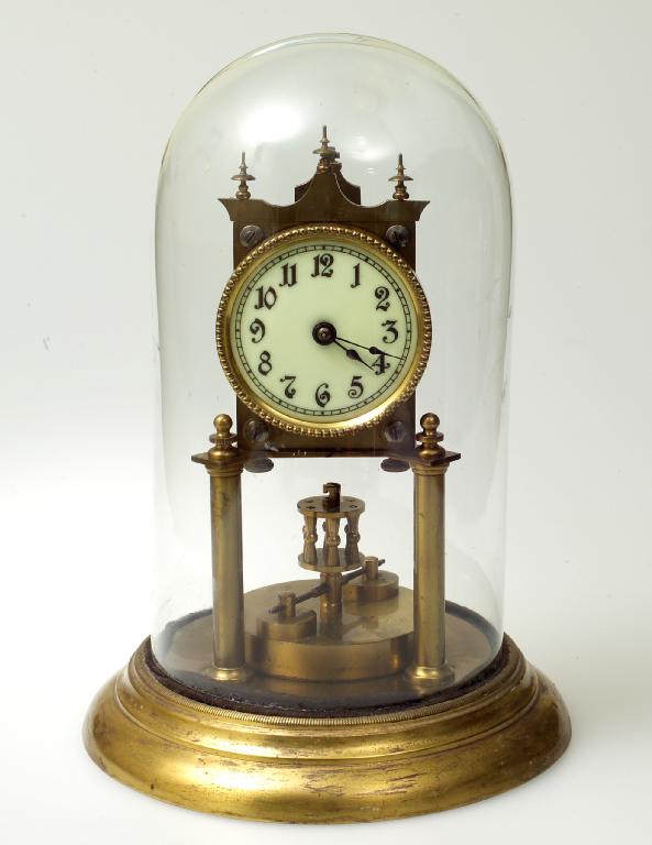 Appraisal: BRASS DAY MANTLE CLOCK the brass spring movement raised on