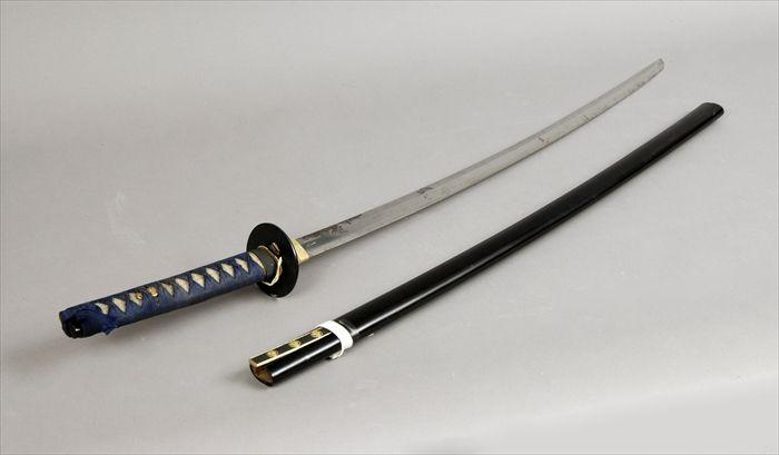 Appraisal: Japanese Katana Sword with Black Lacquer Scabbard in long