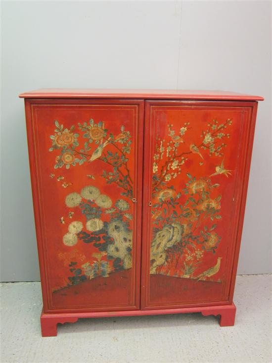 Appraisal: th century Chinese red lacquered two door cabinet with printed