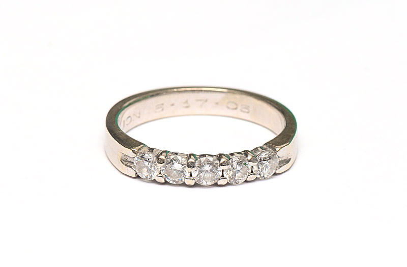 Appraisal: DIAMOND WEDDING OR ANNIVERSARY RING K white gold band contains