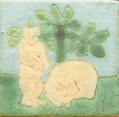 Appraisal: GRUEBY tile decorated in cuenca with two white bears on