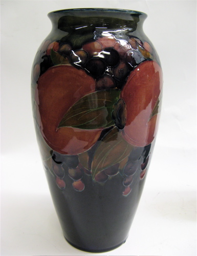 Appraisal: WALTER MOORCROFT POMEGRANATE ART VASE - H c glazed red