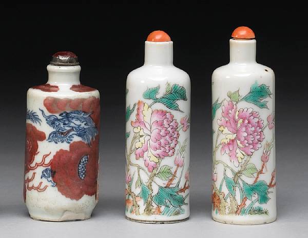 Appraisal: Three porcelain snuff bottles All of simple cylindrical form the