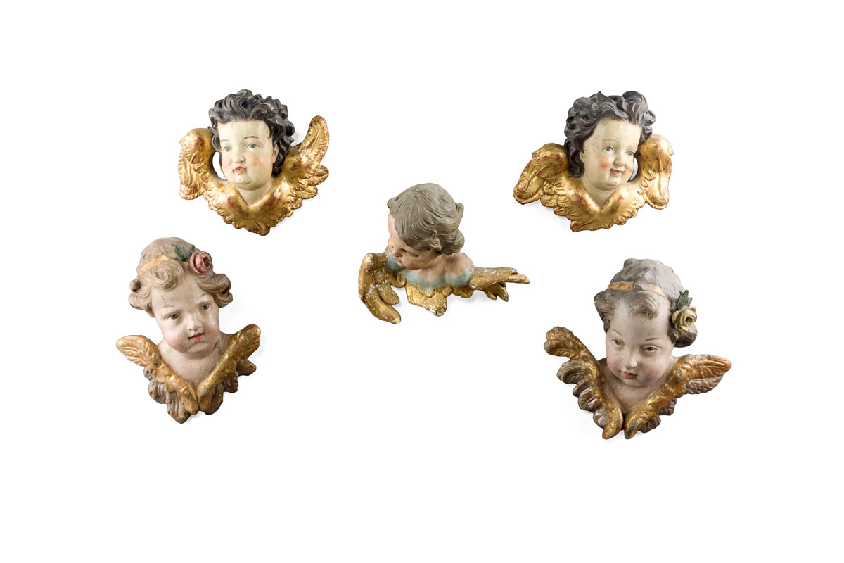 Appraisal: FIVE CONTINENTAL PAINTED AND GILT CHERUBIM Heights to inches widths