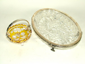 Appraisal: A Latvian oval cut crystal bread basket with reed tie