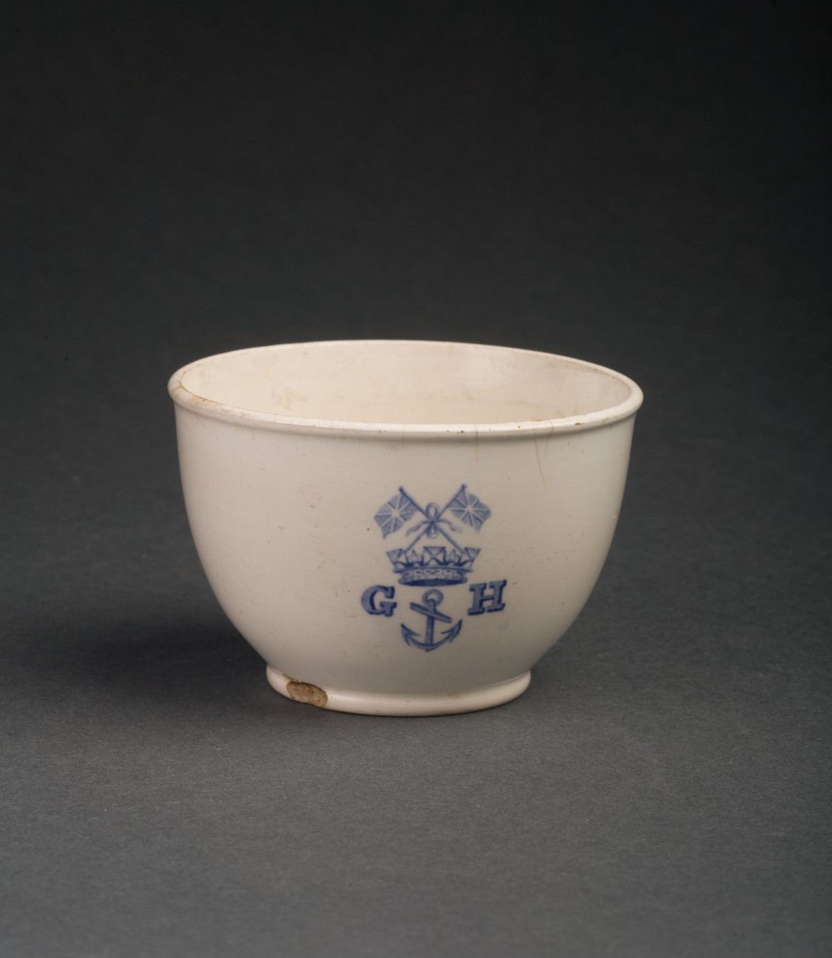 Appraisal: ENGLISH OR AMERICAN BLUE TRANSFER-PRINTED SHIP'S CUP Printed on the