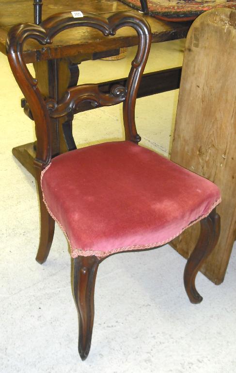 Appraisal: Victorian rosewood balloon back dining chair with stuff-over seat upon