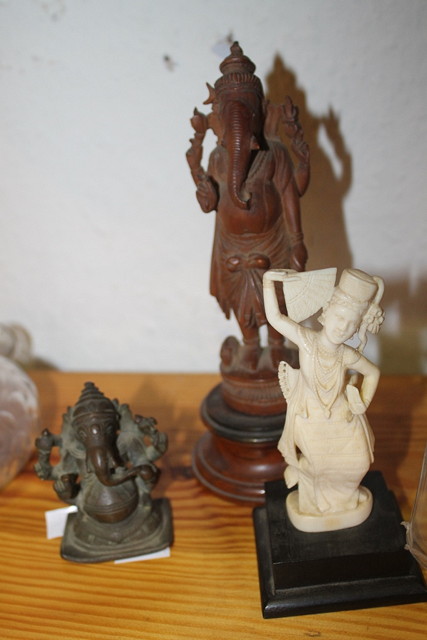 Appraisal: AN INDIAN CARVED WOOD MODEL OF GANESH another bronze model