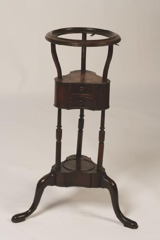 Appraisal: A GEORGE III MAHOGANY BASIN STAND the circular moulded top