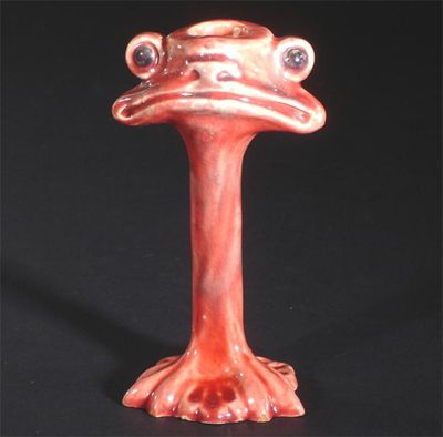 Appraisal: A Baron Barnstaple grotesque Dookey candlestick by Blanche Georgiana Vulliamy