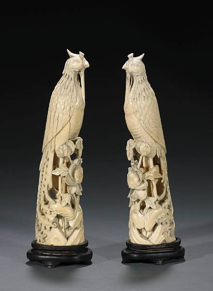 Appraisal: A pair of ivory phoenix birds Late th Century Each