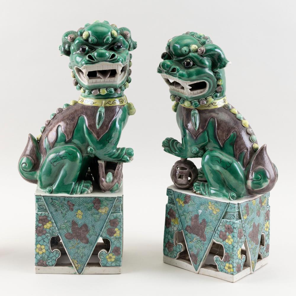 Appraisal: PAIR OF CHINESE SANCAI GLAZE PORCELAIN FU DOGS LATE TH