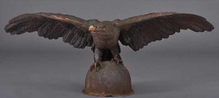 Appraisal: PAINTED CAST-IRON EAGLE FINIAL Modeled perched on a domical base