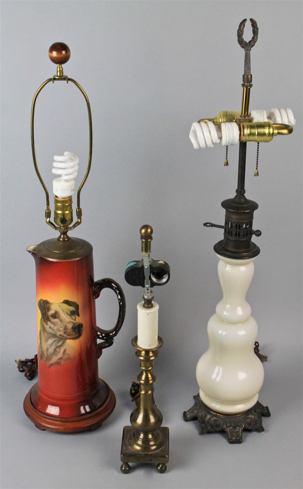 Appraisal: THREE TABLE LAMPS including a large ewer with a transfer