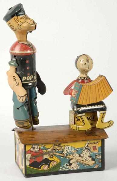 Appraisal: Tin Marx Popeye Olive Oyl Roof Jiggers Toy Description American