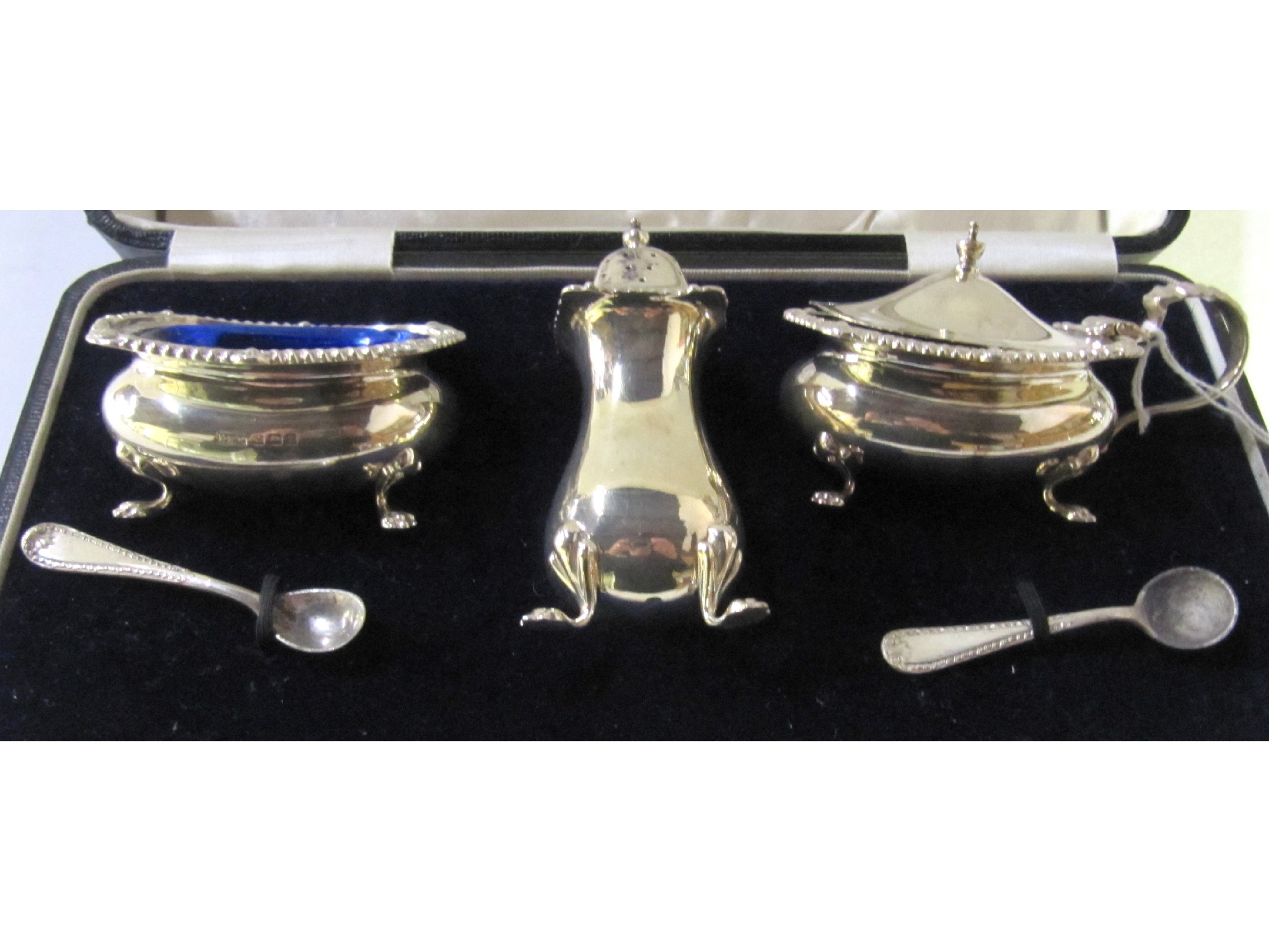 Appraisal: A cased three piece silver condiment set Birmingham