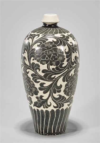 Appraisal: Chinese black and white glazed ceramic vase floral design H