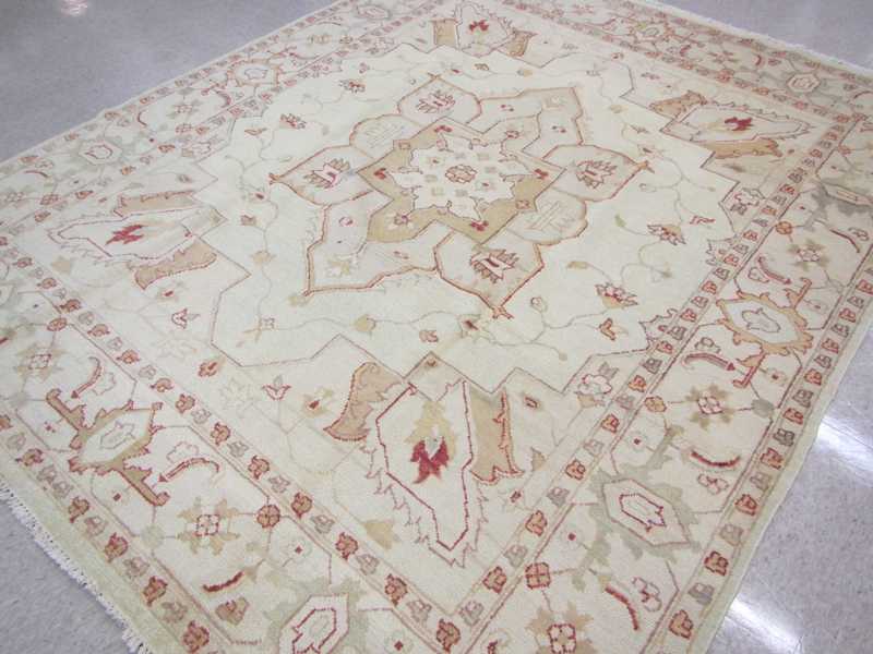 Appraisal: HAND KNOTTED ORIENTAL CARPET Oushak design of West Anatolia red