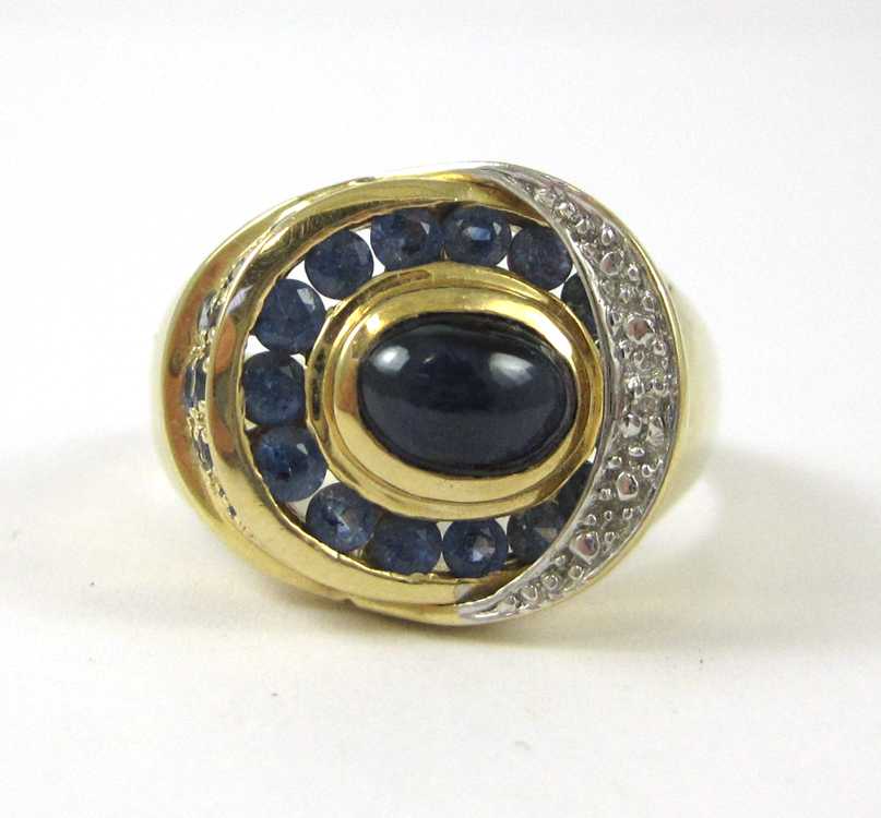 Appraisal: MAN'S SAPPHIRE AND FOURTEEN KARAT GOLD RING with oval-cut light